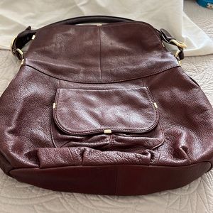 Width up top 12.5” bottom 17” height 12”